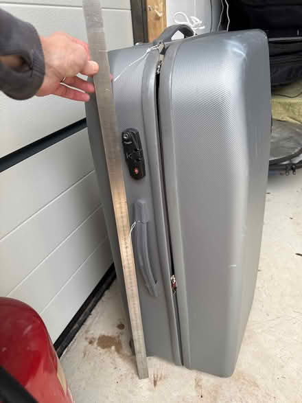 Photo of free 2 large grey hardshell suitcases (Littleham) #2