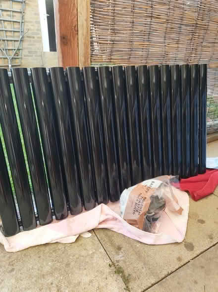 Photo of free Black modern column radiator (Carterton OX18) #1