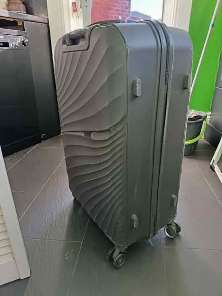 Photo of free Grey suitcase (Holt Lane End M35) #1