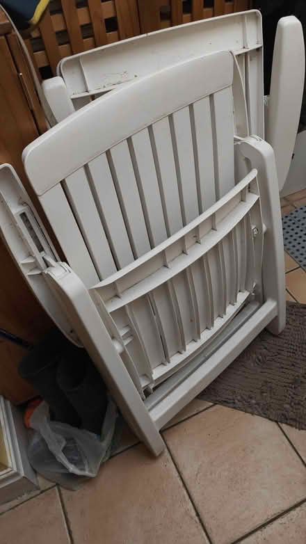 Photo of free White plastic garden chairs (WA5) #2