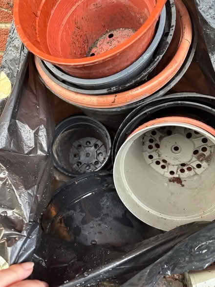 Photo of free 3 black bags full of plastic plant pots (Elsenham CM22) #1