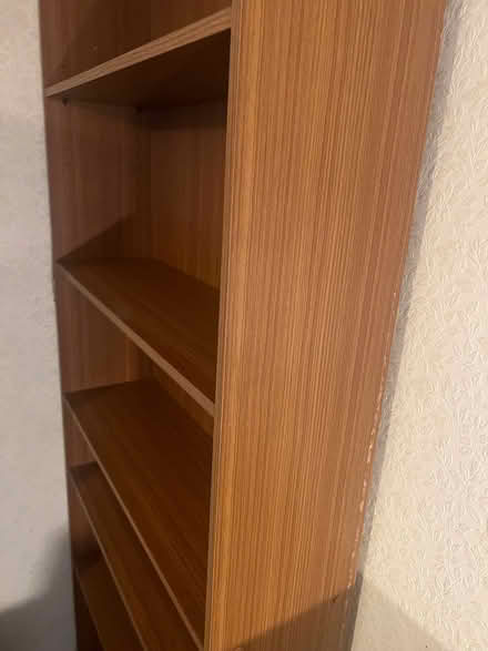 Photo of free Tall teak effect bookcase. 2 vintage wardrobes (Chiswick W4) #2