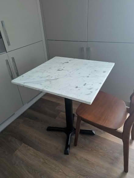 Photo of free Marble topped dining table (Wandsworth Park, SW18) #1