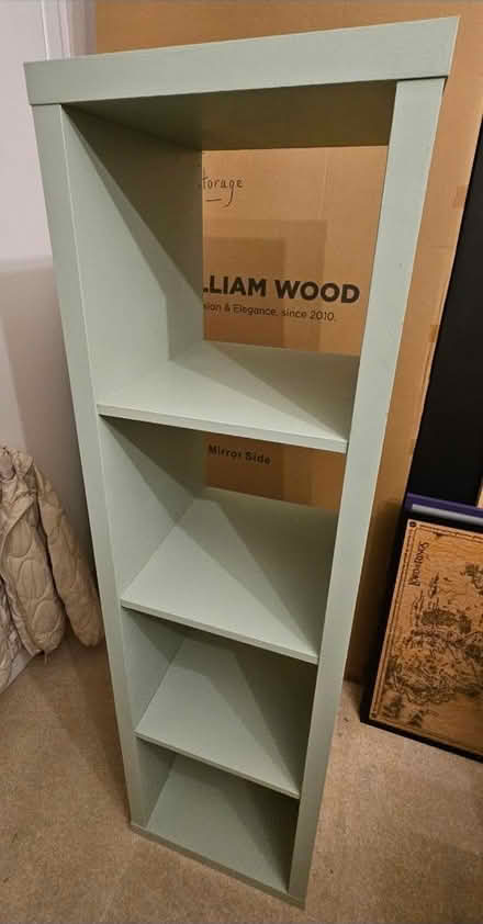 Photo of free Light green narrow bookcase (Cm15 8px) #1