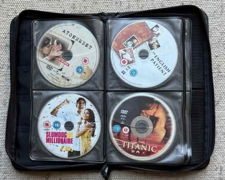 Photo of free Storage case for CDs or DVDs plus a small collection of DVDs (Ashford TW15) #1