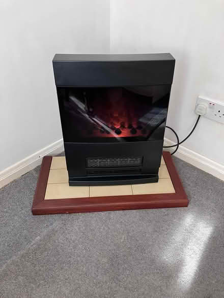 Photo of free Electric Heater / Fireplace + base (SE21) #1
