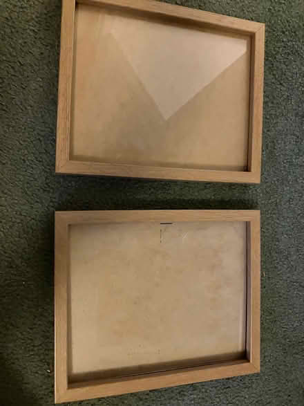 Photo of free Pair of wood effect picture frames (Pant SY10) #1