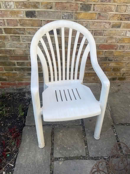 Photo of free Four stackable plastic chairs. Don’t need them (Putney SW15) #1