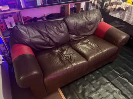Photo of free Brown Leather Couch (V6Z 1R3) #1