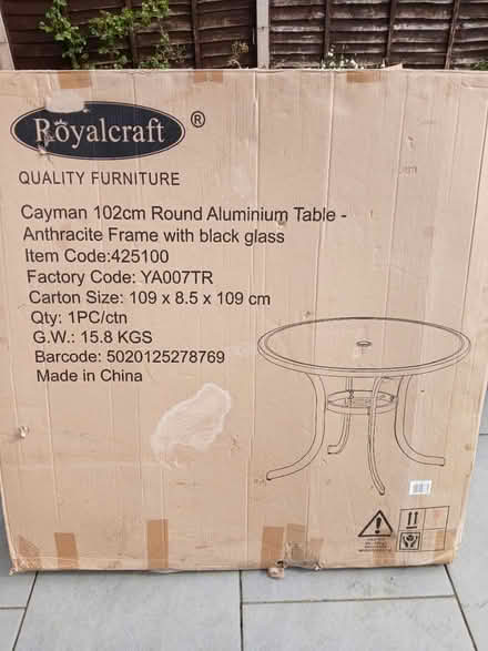 Photo of free Glass topped garden table (Bugbrooke) #1