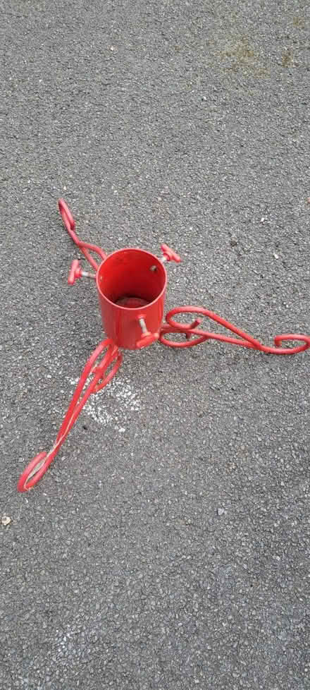 Photo of free Red Christmas tree stand (OX14 off Colwell Drive) #1