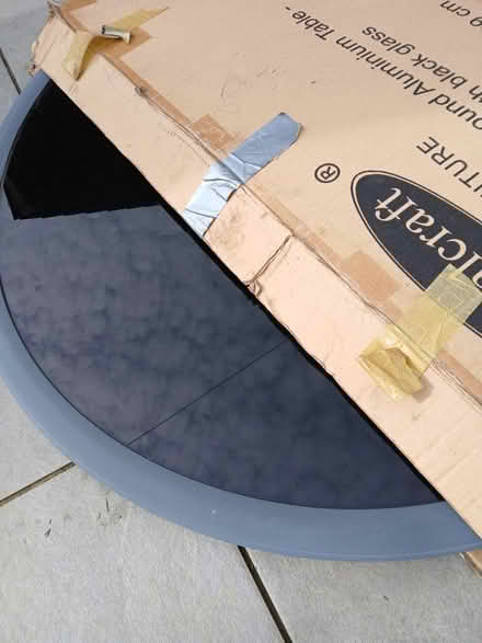 Photo of free Glass topped garden table (Bugbrooke) #2