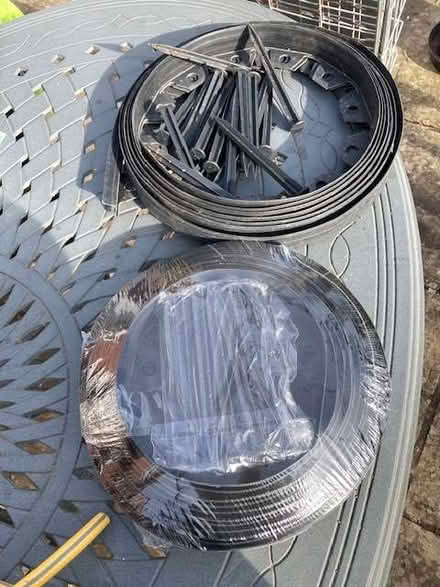 Photo of free Plastic lawn edging, 2 x 10 m with pegs for securing. (Hereford HR1) #1