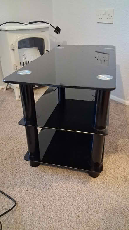 Photo of free Black glass TV stand see photo (West Horsham) #2