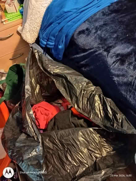 Photo of free black bag full of t-shirts (Drylaw EH4) #1