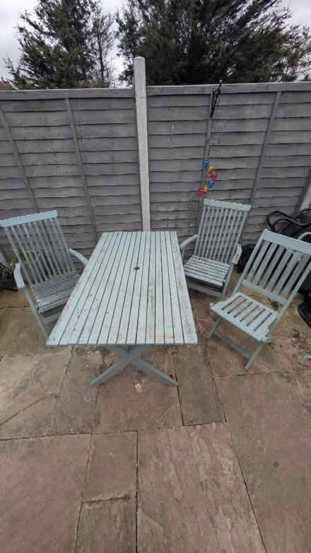 Photo of free Outside Wooden table with 3 chairs (Springfield CM1) #1