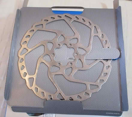 Photo of free Shimano 180mm Disc Rotor - unused, needs straightening (Kingsway) #1