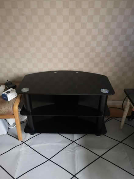 Photo of free Black 3 shelf glass TV unit (M19 Levenshulme) #1