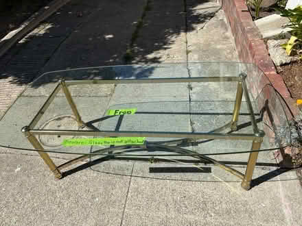 Photo of free Glass top coffee table (East Temescal, (off Broadway)) #1