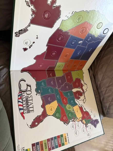 Photo of free State quarter collection book (Emeryville) #1