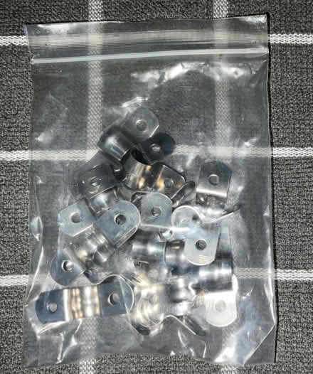 Photo of free Opened Bag of 2 Hole U Brackets (16 in bag) (Southfields SW19) #1