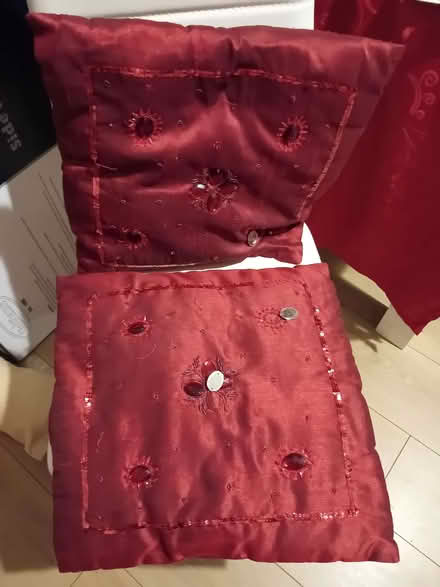 Photo of free 2 red decorative cushions (Sneinton NG2) #1