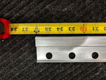 Photo of free IKEA cabinet hanging rail - 36” (60093) #2