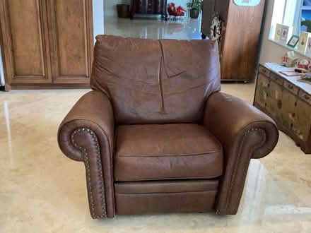 Photo of free brown leather recliner (Parkland) #1