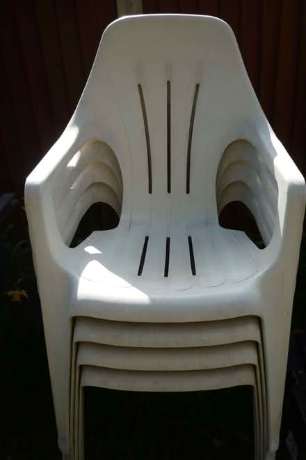 Photo of free White plastic garden chairs (Westfield NR19) #1