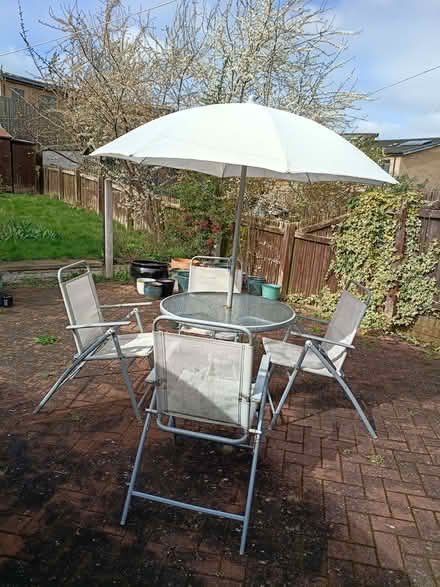 Photo of free Garden table, sunshade & 4 chairs (Normanton Springs S12) #1