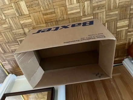 Photo of free Stout cardboard box (Pyrford GU22) #1