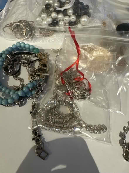 Photo of free Bag of assorted jewelry (SL9 8EL) #4