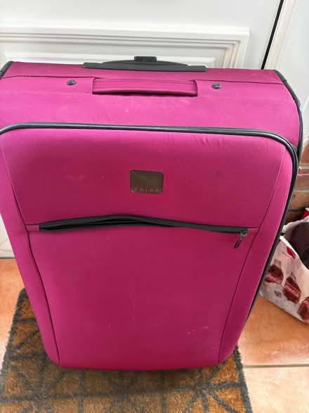 Photo of free Two large suit cases on 2 wheels (Bury BL9) #1