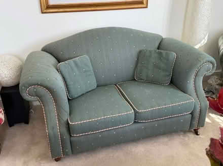 Photo of free Green two seater sofa (Cirencester GL7) #1