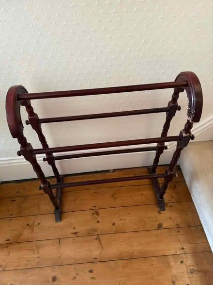 Photo of free Dark wood towel rail scratched (Salford M30) #1