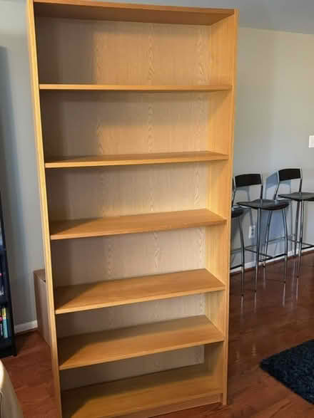 Photo of free 2 Tall wood bookshelves (bethesda) #1