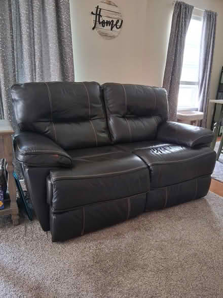 Photo of free Leather Power Reclining Loveseat (Howell Twp. Byron Rd/M59) #1