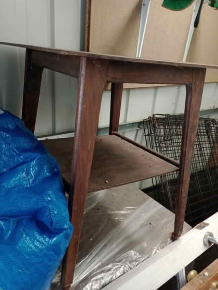 Photo of free NEEDS CLEAN Wooden table on castors (Harton, NE34) #1