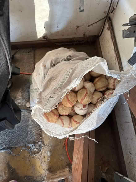 Photo of free Seed bag 1/2 full of baseballs (Danbury-west side) #1