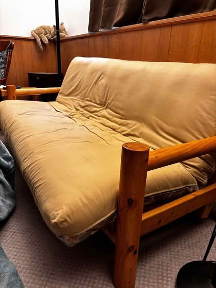 Photo of free Wooden futon couch (near Northport and Sherman Ave) #1