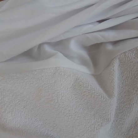 Photo of free Double mattress cover - new (Bampton OX18) #1