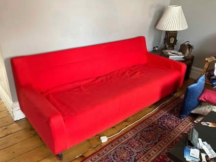 Photo of free IKEA sofa Red cover (NW6) #3