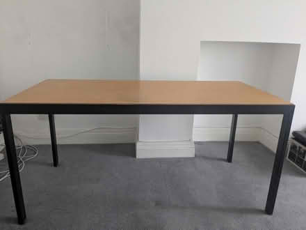Photo of free Large wooden table with metal frame (NW11 8ER) #1
