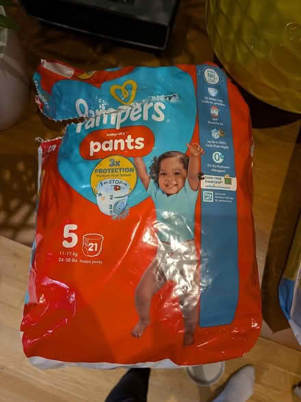 Photo of free Pampers baby dry nappy pants size 5 (SW17) #1
