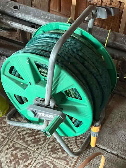 Photo of free Garden hose on reel (Finchampstead RG40) #1