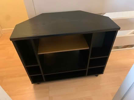 Photo of free Black corner TV stand with wheels (South Harrow HA2) #3