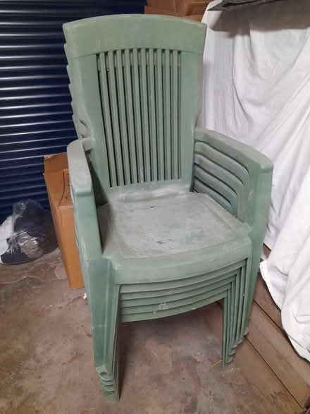 Photo of free 6 plastic stacking garden chairs (Brundall) #1