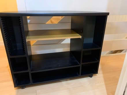 Photo of free Black corner TV stand with wheels (South Harrow HA2) #1