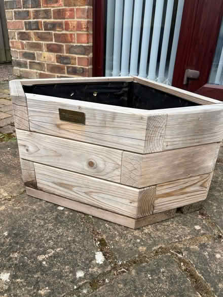 Photo of free Wooden corner planter (West Winch PE33) #1