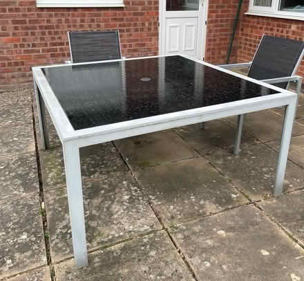 Photo of free Patio table + 8 chairs (Over, CB24) #1